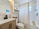 Stylish bathroom showcasing a shower and a modern vanity with drawers at 4231 8Th N St, St Petersburg, FL 33703