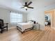 Comfortable bedroom showcasing natural light and a classic ceiling fan at 4231 8Th N St, St Petersburg, FL 33703