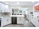 Modern open concept kitchen featuring stainless appliances and stylish accents at 4231 8Th N St, St Petersburg, FL 33703