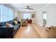 Cozy living room showcasing hardwood floors, comfortable seating, and ample natural light at 4231 8Th N St, St Petersburg, FL 33703