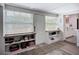 Bright living area with built-in shelves and an entrance to the outdoor area at 4231 8Th N St, St Petersburg, FL 33703