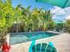 Lush backyard oasis with a private pool, perfect for relaxation and entertaining at 4231 8Th N St, St Petersburg, FL 33703