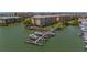 Aerial view featuring boat slips and the property at 425 150Th Ave # 2301, Madeira Beach, FL 33708