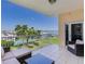 Relax on the balcony with seating and a stunning view of the marina at 425 150Th Ave # 2301, Madeira Beach, FL 33708