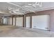 Garage showing white doors in a shared secure parking structure at 425 150Th Ave # 2301, Madeira Beach, FL 33708