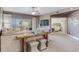 Comfortable living room featuring modern decor and a peek into the tranquil Primary bedroom at 425 150Th Ave # 2301, Madeira Beach, FL 33708
