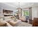 Bright and airy living room with hardwood floors and an open layout at 4419 Ortona Ln, Wesley Chapel, FL 33543