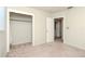 Bright bedroom with an open closet and neutral carpet, perfect for a cozy retreat at 4425 W Bay Villa Ave, Tampa, FL 33611