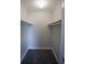 Walk-in closet with ample shelving and carpeted floor at 455 Alt 19 S # 235, Palm Harbor, FL 34683