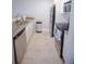 Galley kitchen with stainless steel appliances and granite countertops at 455 Alt 19 S # 235, Palm Harbor, FL 34683