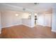Bright living room features wood floors and modern lighting at 455 Alt 19 S # 235, Palm Harbor, FL 34683
