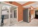 A kitchen showcasing stainless steel refrigerator and sliding door access to the outdoor patio at 50 Balsam Dr, Oldsmar, FL 34677