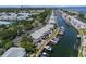 Aerial view of waterfront condos, canal, boat docks, and cityscape of St. Petersburg, Florida in the background at 5174 Beach Se Dr # B, St Petersburg, FL 33705