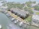 Aerial view showcasing a condo community on the water, highlighting waterfront living at its finest at 5174 Beach Se Dr # B, St Petersburg, FL 33705
