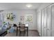 Bright dining area features wood floors, natural light, and closet at 5174 Beach Se Dr # B, St Petersburg, FL 33705
