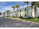 Well-maintained yellow condos with lush landscaping and convenient parking at 5174 Beach Se Dr # B, St Petersburg, FL 33705