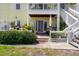 Beautiful exterior view of the property with a well-maintained patio and lush landscaping at 5174 Beach Se Dr # B, St Petersburg, FL 33705