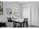 Bright office space featuring a modern desk, dual closets, and a light-filled window at 5174 Beach Se Dr # B, St Petersburg, FL 33705