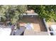 Aerial view of the backyard with storage shed and grill at 551 84Th N Ave, St Petersburg, FL 33702