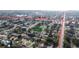 An aerial view of a quiet neighborhood showcasing the property's convenient location near 4th St N and 83rd Ave N at 551 84Th N Ave, St Petersburg, FL 33702