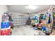 Spacious garage with an automatic door and is used for storage at 5735 Mezzana Run, Palmetto, FL 34221