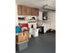 This is the inside of a garage with plenty of space and storage at 7321 Isle Dr, Port Richey, FL 34668