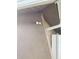 Close-up of a security camera mounted to the exterior wall of the home at 7321 Isle Dr, Port Richey, FL 34668