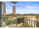 Scenic balcony with outdoor seating overlooking the city skyline at 777 N Ashley Dr # 402, Tampa, FL 33602