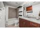 Bathroom with a tub, tile shower, and granite countertop at 777 N Ashley Dr # 402, Tampa, FL 33602