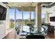 Elegant dining space with modern lighting and stunning city views at 777 N Ashley Dr # 402, Tampa, FL 33602
