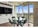 Stylish dining area featuring contemporary furnishings and city views at 777 N Ashley Dr # 402, Tampa, FL 33602
