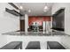 Open kitchen layout with granite counter tops and stainless steel appliances at 777 N Ashley Dr # 402, Tampa, FL 33602