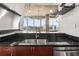 Stylish kitchen with dark countertops and a view of the city at 777 N Ashley Dr # 402, Tampa, FL 33602