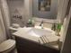 Cozy bathroom with modern sink and countertop at 7941 Clarendon Dr, New Port Richey, FL 34654