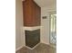 Living area featuring a fireplace and sliding glass doors to the outdoor patio at 7941 Clarendon Dr, New Port Richey, FL 34654