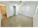 Bright bedroom with ceiling fan, closet, and bathroom access, offers a comfortable living space at 5604 Larimer Dr, Tampa, FL 33615