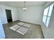 Cozy dining room with neutral paint, vintage chandelier and tile flooring at 5604 Larimer Dr, Tampa, FL 33615