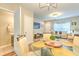 Dining area with open floor plan, seamlessly connecting to the living room and kitchen at 10106 Bessemer Pond Ct, Riverview, FL 33578