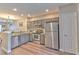 Well-equipped kitchen with stainless steel appliances and ample cabinet space at 10106 Bessemer Pond Ct, Riverview, FL 33578