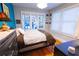 Cozy bedroom featuring hardwood floors, bright natural light, and stylish décor at 1036 23Rd N Ave, St Petersburg, FL 33704