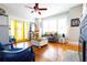 Inviting living room with hardwood floors, large windows, and comfortable seating at 1036 23Rd N Ave, St Petersburg, FL 33704