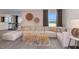 Cozy living room with plush sectional sofa and ample natural light at 10537 Longmeadow Ave, Parrish, FL 34219