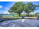 Dog park featuring dog run features with a water area, benches and a lush green lawn at 10928 Brickside Ct, Riverview, FL 33579