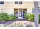 Exterior view of screened patio with view of backyard and greenery at 10928 Brickside Ct, Riverview, FL 33579