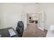 Home office with desk and chair, providing a functional workspace with ample natural light at 11165 Little Gull Rd, Weeki Wachee, FL 34614