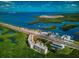 Breathtaking aerial view showcasing waterfront condos, a marina, and easy access to the city at 12033 Gandy N Blvd # 131, St Petersburg, FL 33702