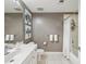 A bathroom with a white vanity, a mirror, and a shower with a white curtain at 12033 Gandy N Blvd # 131, St Petersburg, FL 33702