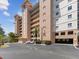 Beautiful condo building with covered parking, manicured landscaping, and ample parking spaces at 12033 Gandy N Blvd # 131, St Petersburg, FL 33702