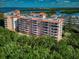 Attractive waterfront condominiums featuring balconies, lush landscaping, and beautiful water access at 12033 Gandy N Blvd # 131, St Petersburg, FL 33702