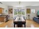 Dining room area with hardwood floors and views of the outdoor scenery at 12033 Gandy N Blvd # 131, St Petersburg, FL 33702
